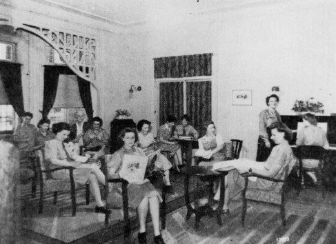 Group of servicewomen in the lounge room at Wairuna in Highgate Hill Brisbane in the 1940s